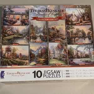 Thomas Kinkade 10 puzzle collection (9 never open)